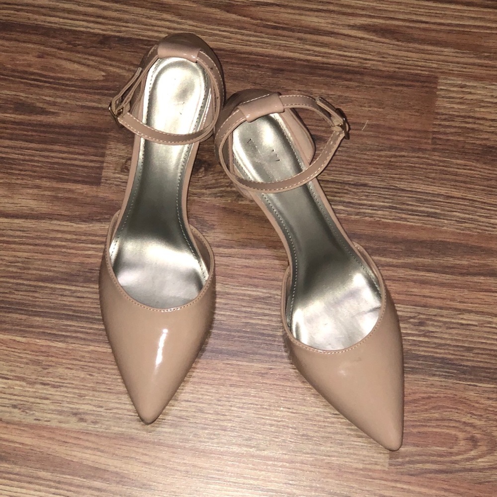 Nude pointy-toed heels. Brand new w/o tags.